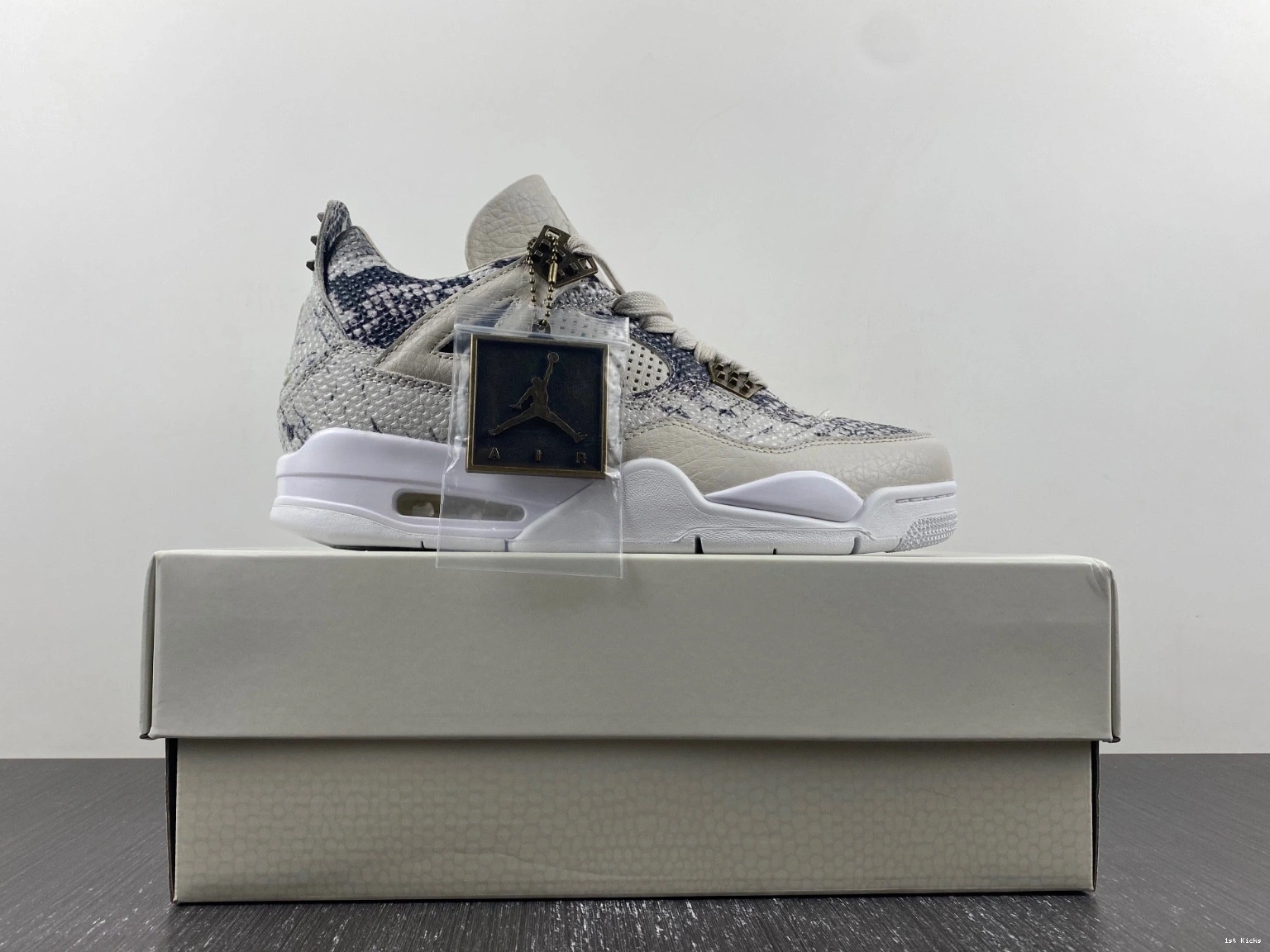 - 819139-030 Retro Snakeskin Jordan 4 1225